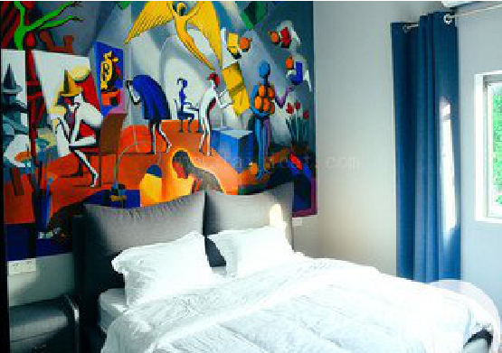 修武对于酒店的墙体彩绘而言更注重哪些方面？